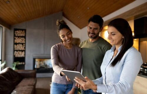 A real estate agent doing a showing